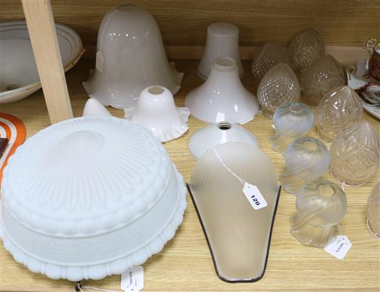 A collection of glass shades for ceiling and wall lights, largest diameter 42cm